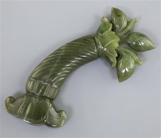 A Mughal spinach jade dagger handle, 5.75in.